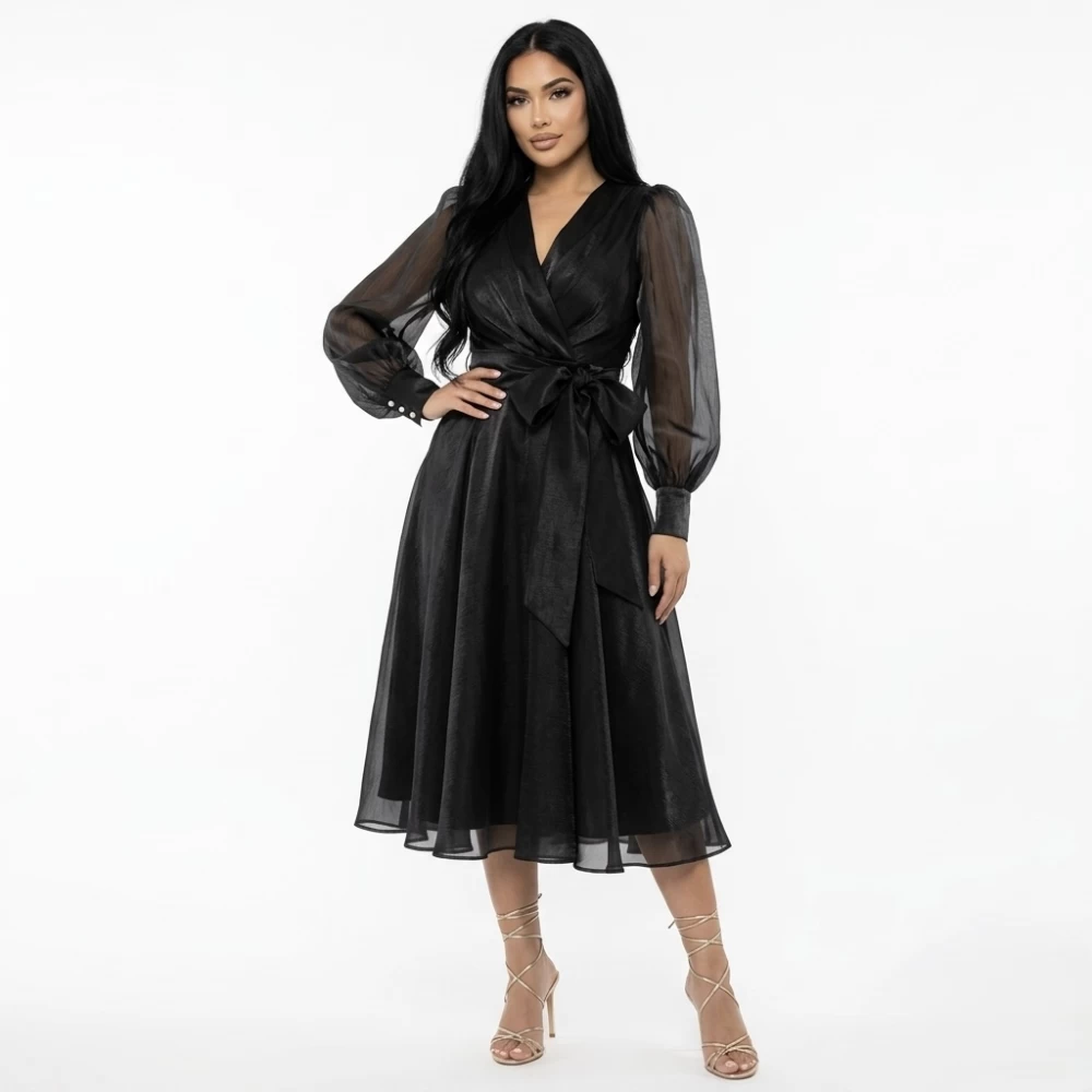 Rochie neagra din organza cu talie elastica si bust petrecut