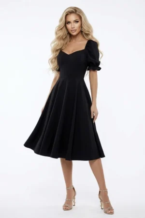 Rochie eleganta neagra din material vaporos cu croi in clos si buzunare laterale